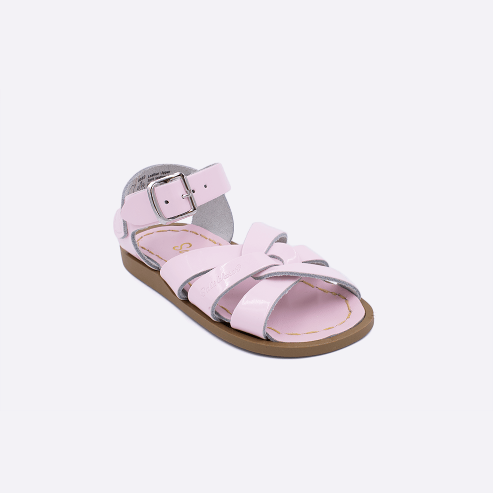 One toddler sized 800 Original style sandal with shiny pink straps and a shiny pink insole. Facing left to right diagonally. 